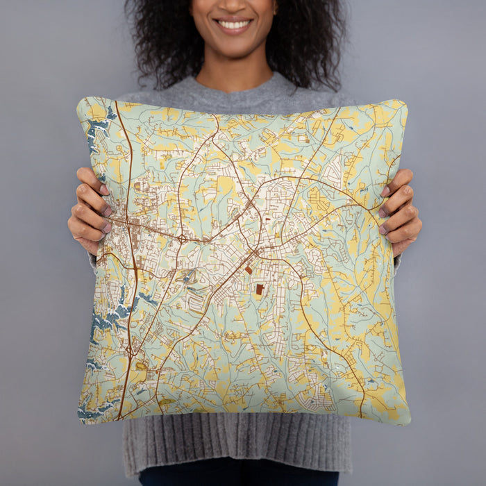Person holding 18x18 Custom Mooresville North Carolina Map Throw Pillow in Woodblock