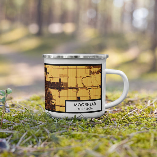 Right View Custom Moorhead Minnesota Map Enamel Mug in Ember on Grass With Trees in Background