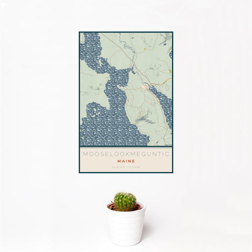 12x18 Mooselookmeguntic Maine Map Print Portrait Orientation in Woodblock Style With Small Cactus Plant in White Planter