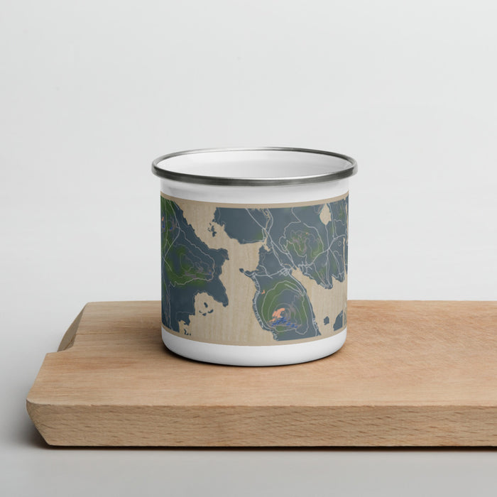 Front View Custom Mooselookmeguntic Maine Map Enamel Mug in Afternoon on Cutting Board