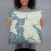 Person holding 18x18 Custom Mooselookmeguntic Maine Map Throw Pillow in Woodblock