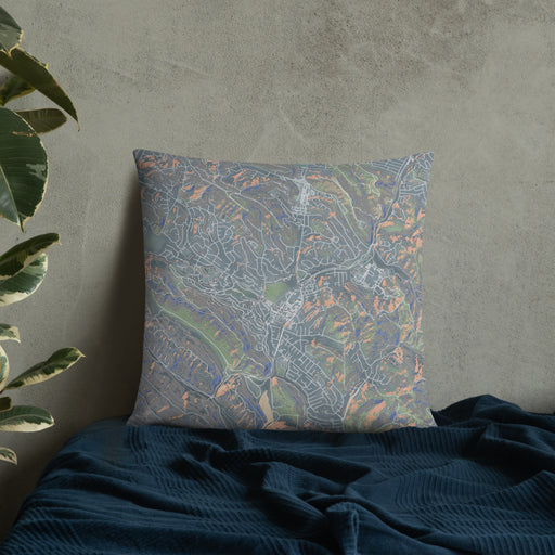 Custom Moraga California Map Throw Pillow in Afternoon on Bedding Against Wall