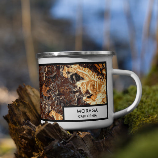 Right View Custom Moraga California Map Enamel Mug in Ember on Grass With Trees in Background