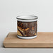 Front View Custom Moraga California Map Enamel Mug in Ember on Cutting Board