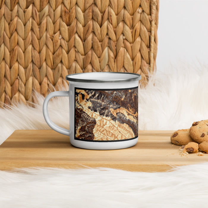 Left View Custom Moraga California Map Enamel Mug in Ember on Table Top