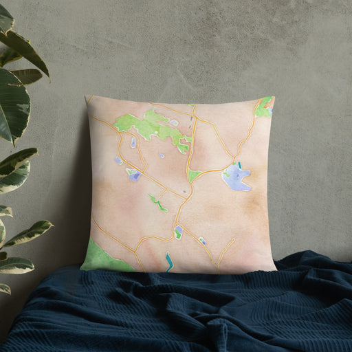 Custom Moraga California Map Throw Pillow in Watercolor on Bedding Against Wall