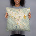 Person holding 18x18 Custom Moraga California Map Throw Pillow in Woodblock