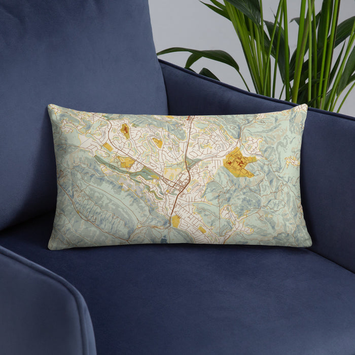 Custom Moraga California Map Throw Pillow in Woodblock on Blue Colored Chair