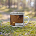 Right View Custom Moscow Idaho Map Enamel Mug in Ember on Grass With Trees in Background