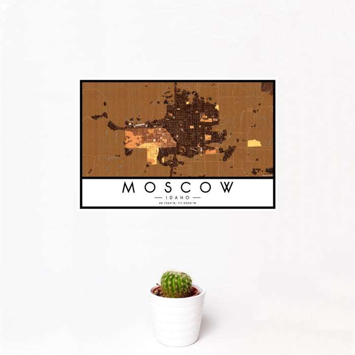 12x18 Moscow Idaho Map Print Landscape Orientation in Ember Style With Small Cactus Plant in White Planter