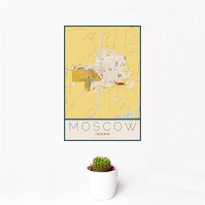 12x18 Moscow Idaho Map Print Portrait Orientation in Woodblock Style With Small Cactus Plant in White Planter