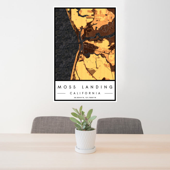 24x36 Moss Landing California Map Print Portrait Orientation in Ember Style Behind 2 Chairs Table and Potted Plant
