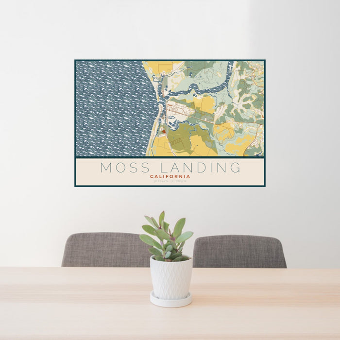24x36 Moss Landing California Map Print Lanscape Orientation in Woodblock Style Behind 2 Chairs Table and Potted Plant