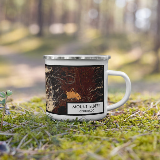 Right View Custom Mount Elbert Colorado Map Enamel Mug in Ember on Grass With Trees in Background