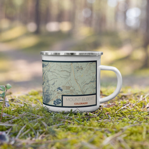 Right View Custom Mount Elbert Colorado Map Enamel Mug in Woodblock on Grass With Trees in Background