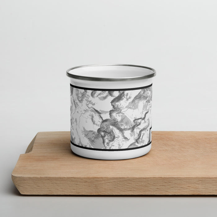 Front View Custom Mount Evans Colorado Map Enamel Mug in Classic on Cutting Board