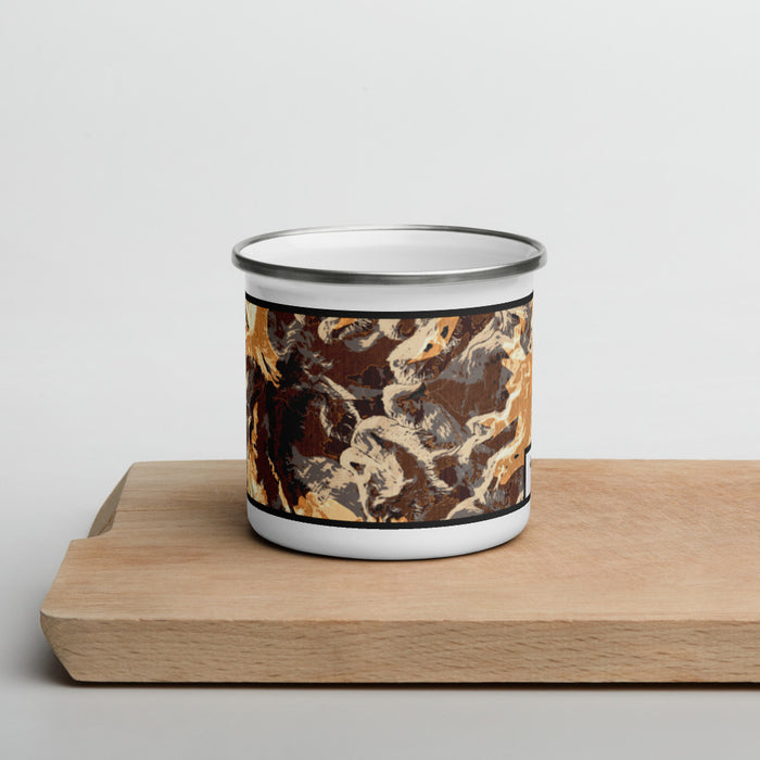 Front View Custom Mount Evans Colorado Map Enamel Mug in Ember on Cutting Board
