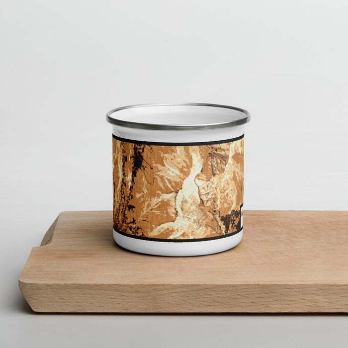 Front View Custom Mount Mansfield Vermont Map Enamel Mug in Ember on Cutting Board