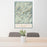 24x36 Mount Marcy New York Map Print Portrait Orientation in Woodblock Style Behind 2 Chairs Table and Potted Plant