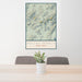 24x36 Mount Marcy New York Map Print Portrait Orientation in Woodblock Style Behind 2 Chairs Table and Potted Plant