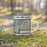 Right View Custom Mount Mitchell North Carolina Map Enamel Mug in Woodblock on Grass With Trees in Background