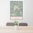 24x36 Mount Rainier Washington Map Print Portrait Orientation in Woodblock Style Behind 2 Chairs Table and Potted Plant