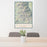 24x36 Mount Whitney California Map Print Portrait Orientation in Woodblock Style Behind 2 Chairs Table and Potted Plant