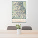 24x36 Mount Whitney California Map Print Portrait Orientation in Woodblock Style Behind 2 Chairs Table and Potted Plant