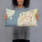 Person holding 20x12 Custom Mukilteo Washington Map Throw Pillow in Woodblock
