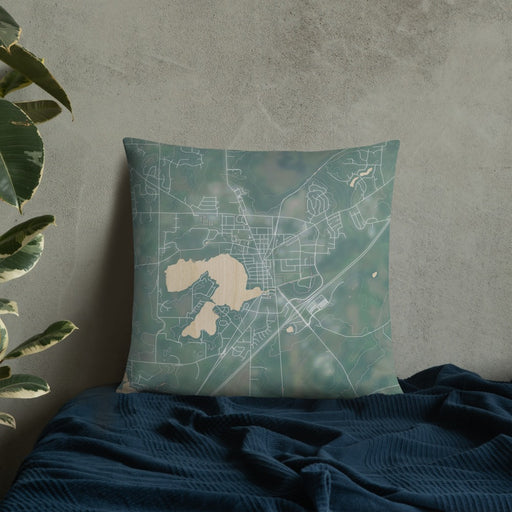 Custom Mukwonago Wisconsin Map Throw Pillow in Afternoon on Bedding Against Wall