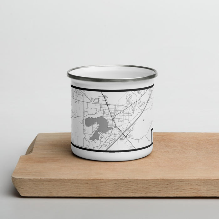 Front View Custom Mukwonago Wisconsin Map Enamel Mug in Classic on Cutting Board