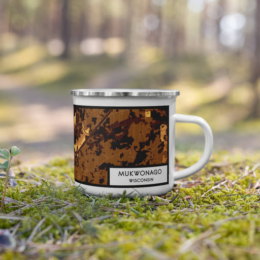 Right View Custom Mukwonago Wisconsin Map Enamel Mug in Ember on Grass With Trees in Background