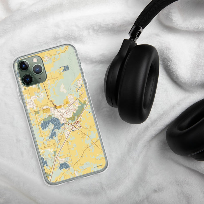 Custom Mukwonago Wisconsin Map Phone Case in Woodblock on Table with Black Headphones