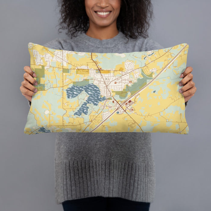 Person holding 20x12 Custom Mukwonago Wisconsin Map Throw Pillow in Woodblock