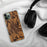 Custom Mullins South Carolina Map Phone Case in Ember on Table with Black Headphones