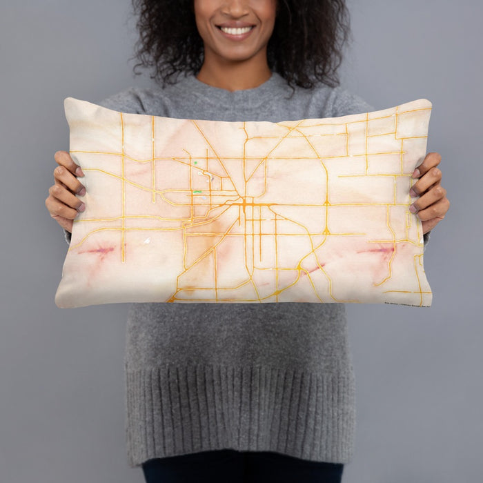 Person holding 20x12 Custom Muncie Indiana Map Throw Pillow in Watercolor
