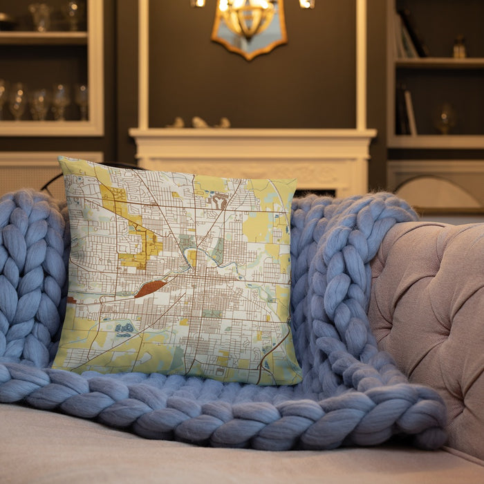 Custom Muncie Indiana Map Throw Pillow in Woodblock on Cream Colored Couch