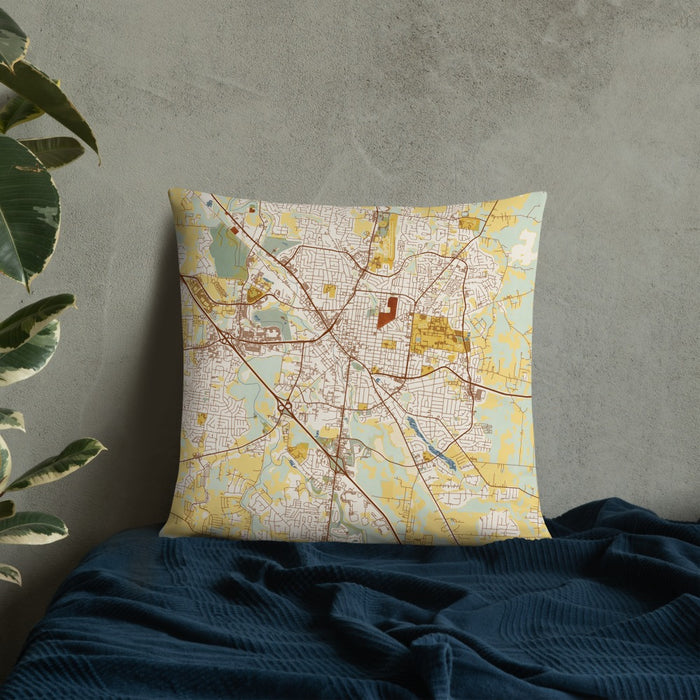 Custom Murfreesboro Tennessee Map Throw Pillow in Woodblock on Bedding Against Wall