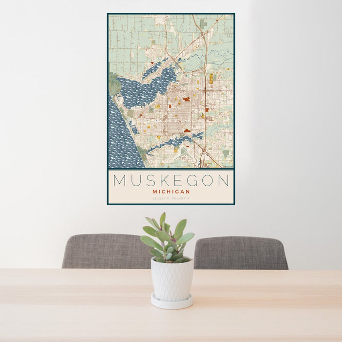 24x36 Muskegon Michigan Map Print Portrait Orientation in Woodblock Style Behind 2 Chairs Table and Potted Plant