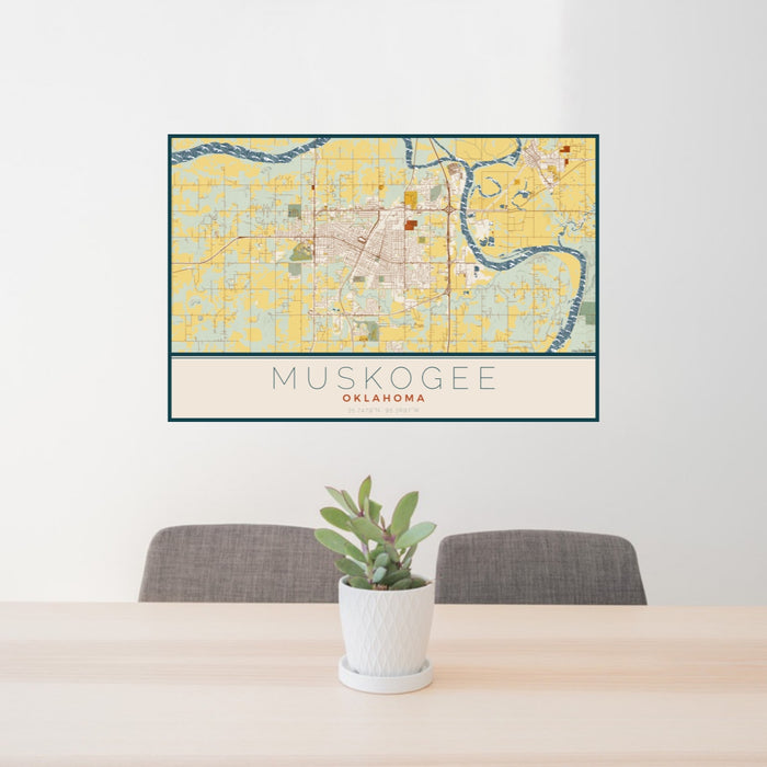 24x36 Muskogee Oklahoma Map Print Lanscape Orientation in Woodblock Style Behind 2 Chairs Table and Potted Plant