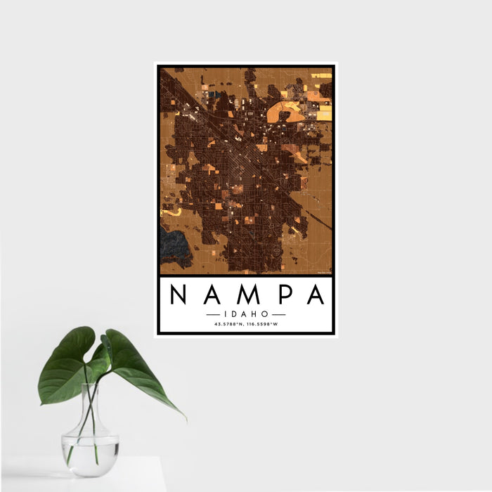16x24 Nampa Idaho Map Print Portrait Orientation in Ember Style With Tropical Plant Leaves in Water
