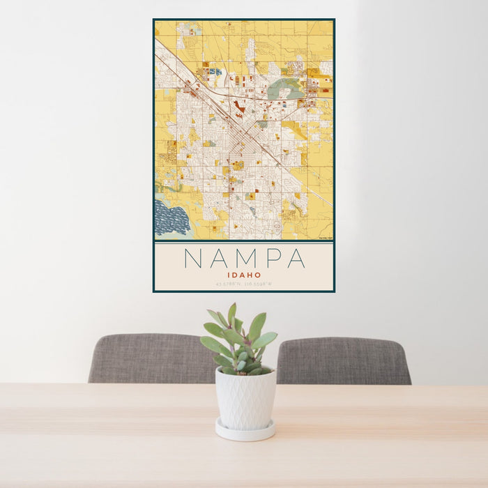 24x36 Nampa Idaho Map Print Portrait Orientation in Woodblock Style Behind 2 Chairs Table and Potted Plant