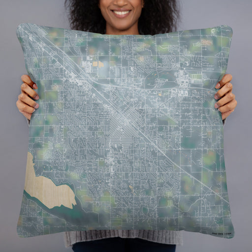 Person holding 22x22 Custom Nampa Idaho Map Throw Pillow in Afternoon