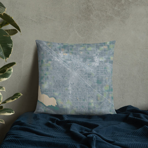Custom Nampa Idaho Map Throw Pillow in Afternoon on Bedding Against Wall