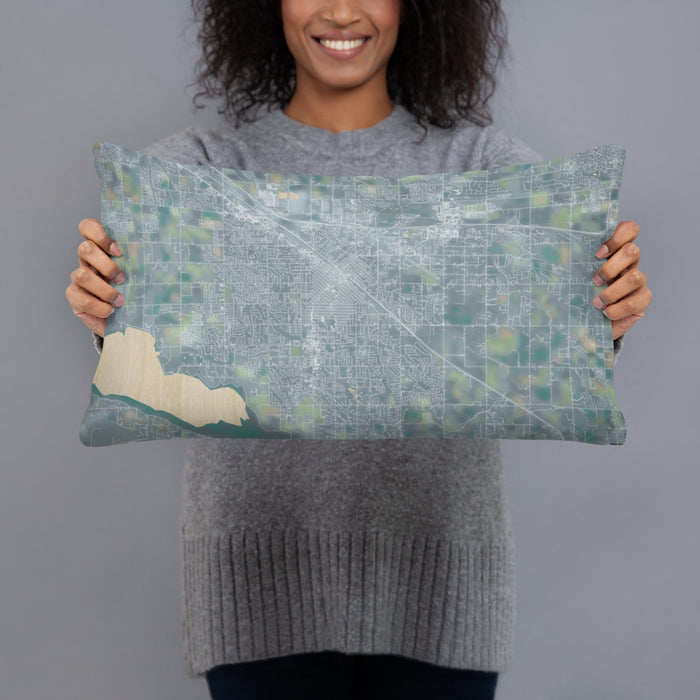 Person holding 20x12 Custom Nampa Idaho Map Throw Pillow in Afternoon