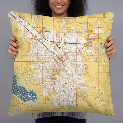 Person holding 22x22 Custom Nampa Idaho Map Throw Pillow in Woodblock