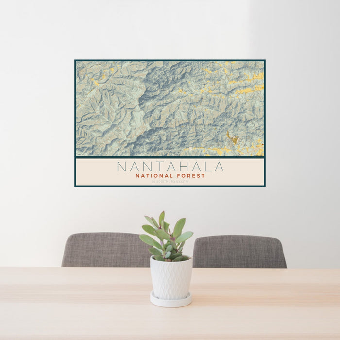 24x36 Nantahala National Forest Map Print Lanscape Orientation in Woodblock Style Behind 2 Chairs Table and Potted Plant