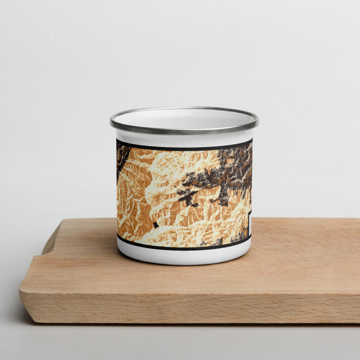 Front View Custom Nantahala National Forest Map Enamel Mug in Ember on Cutting Board