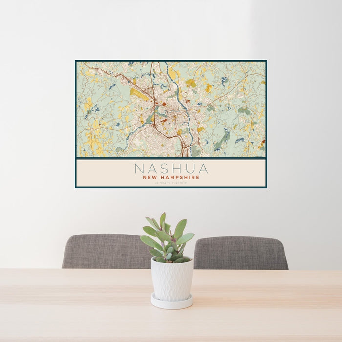 24x36 Nashua New Hampshire Map Print Landscape Orientation in Woodblock Style Behind 2 Chairs Table and Potted Plant