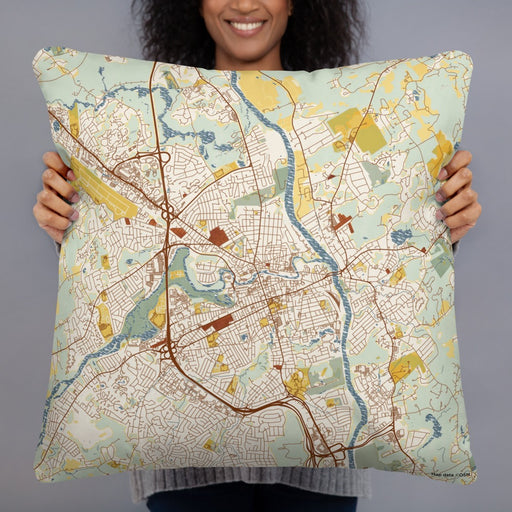 Person holding 22x22 Custom Nashua New Hampshire Map Throw Pillow in Woodblock